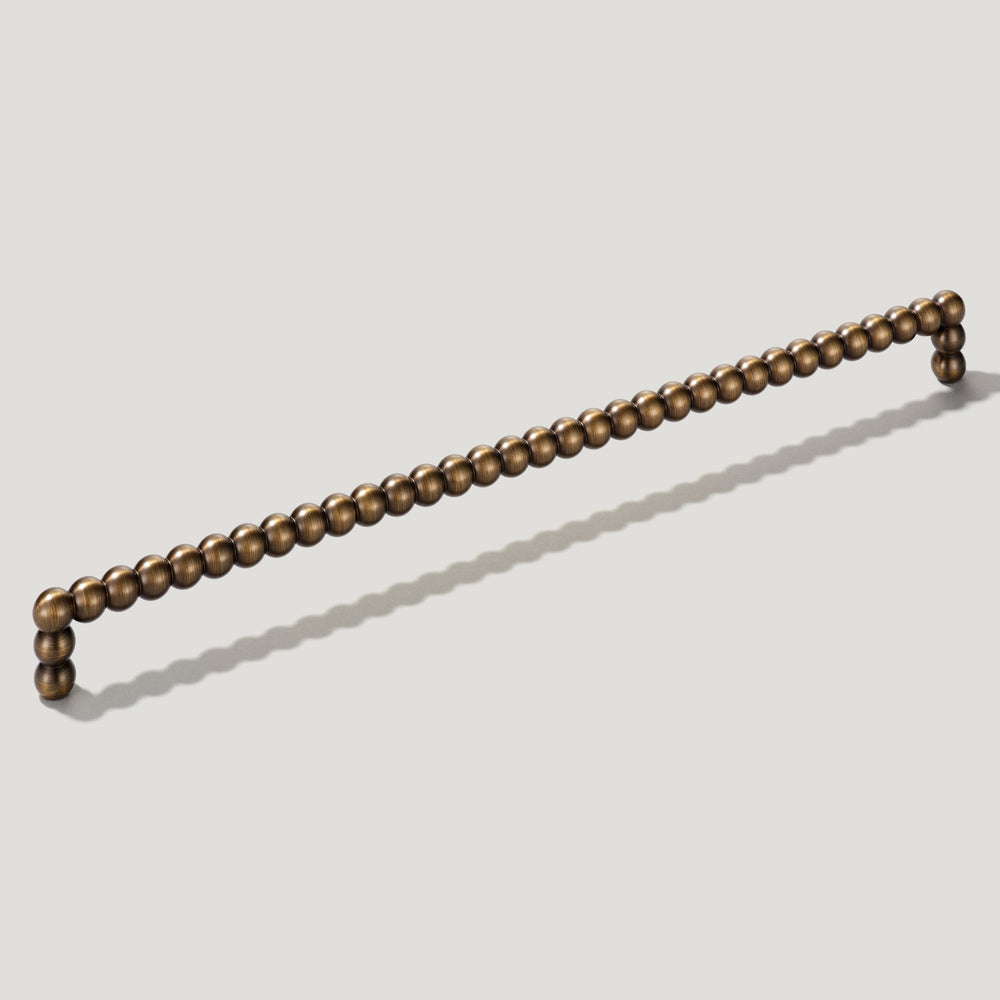 BOBBIN Closet Bar Handle - Antique Brass