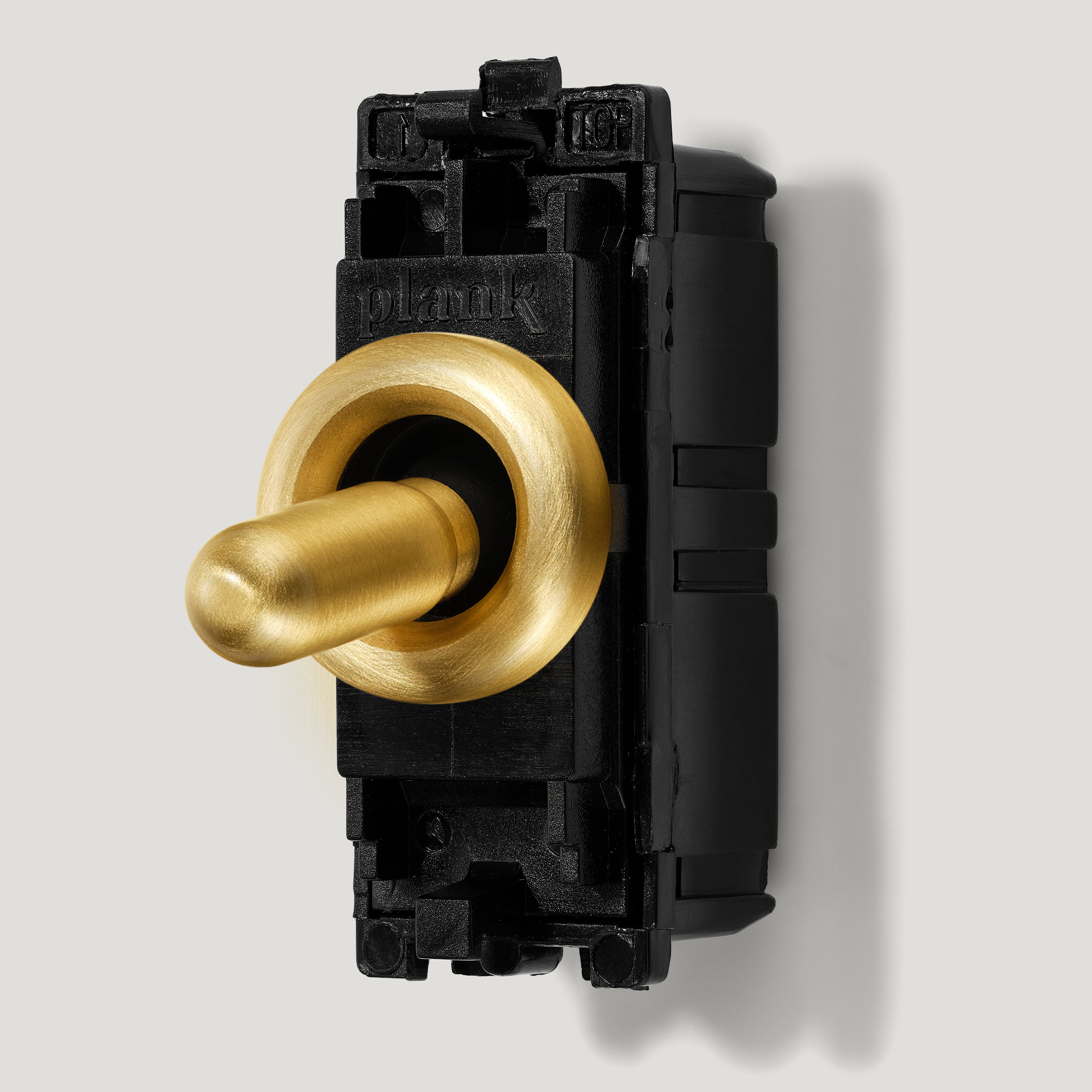 Plank Hardware Electric Components PALO Round Two Way Toggle Detail with Module - Brass