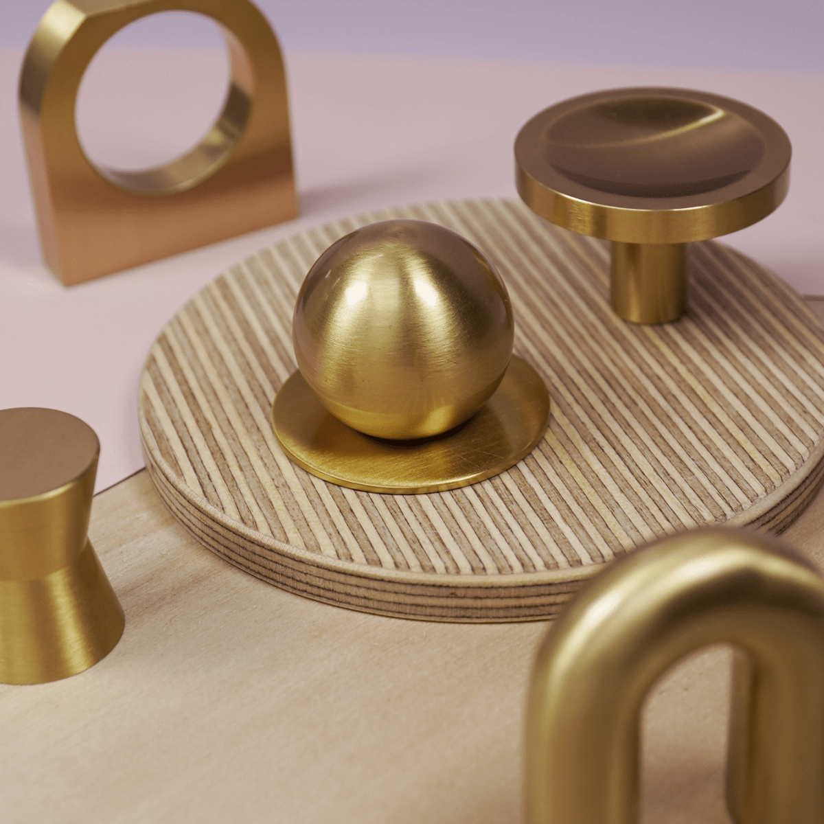 https://plankhardware.com/cdn/shop/products/plank-hardware-handles-knobs-linton-loop-ring-pull-brass-28795630354530_2048x2048.png?v=1662543093